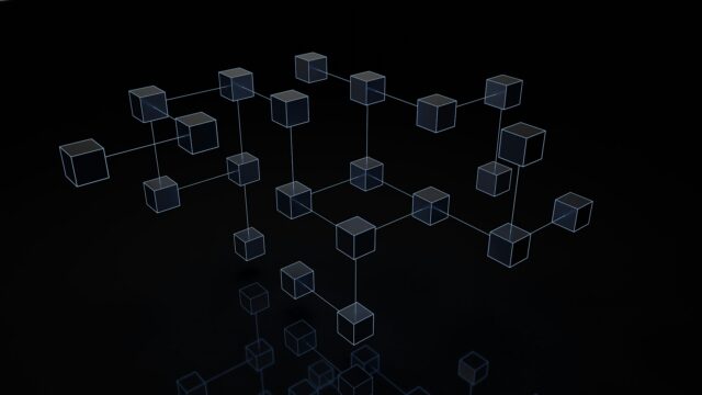 Black and white photo of cubes on black background